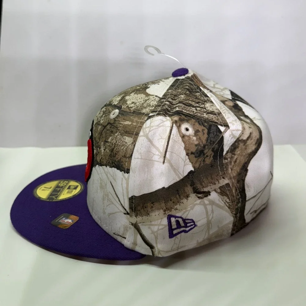 New Era Toronto Raptors Hat Mens 7 1/8 Purple RealTree Camo 59FIFTY Fitted NBA